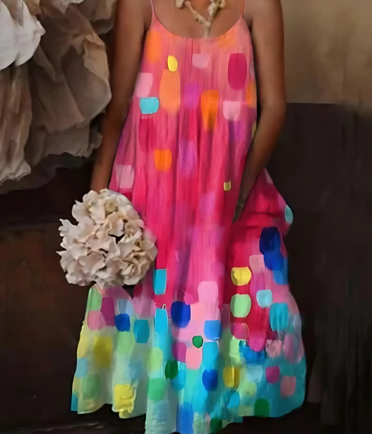 ピンクのスタイリッシュなノースリーブドレス