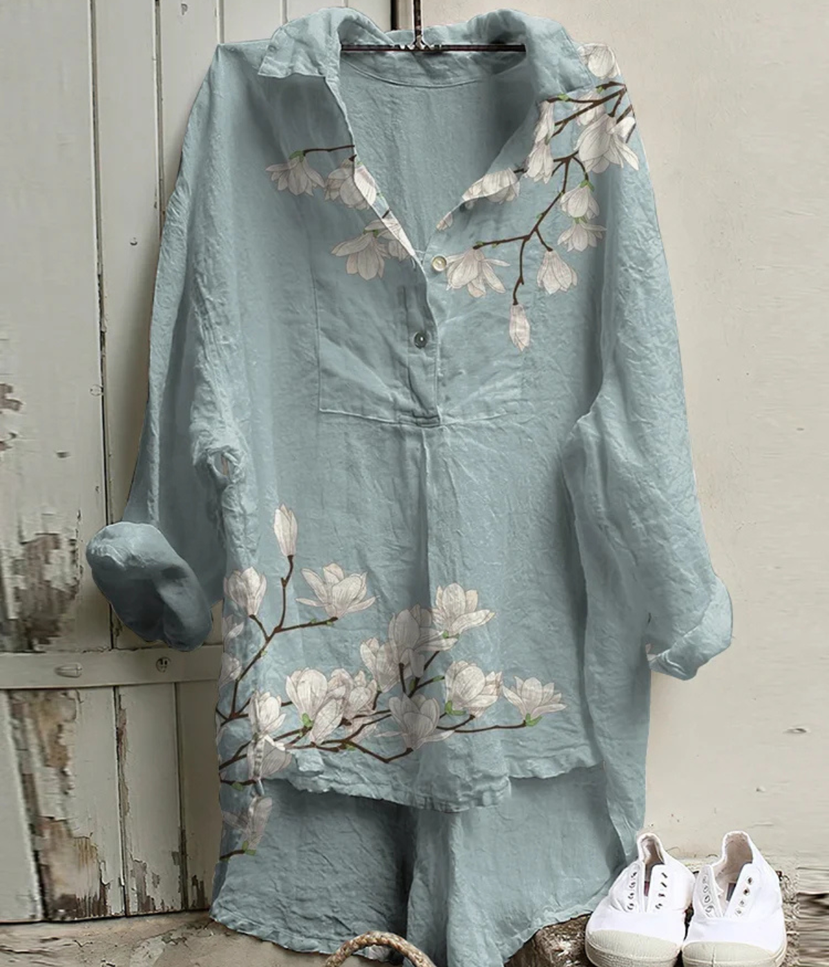 芸術的なブルーのヴィンテージVネックブラウス