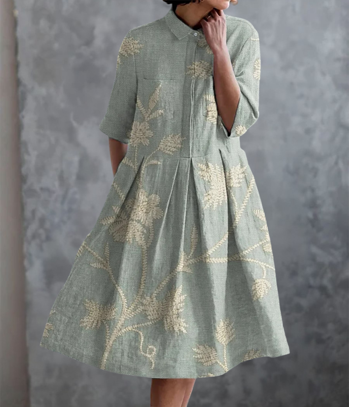 ライトブルーのダブルポケットドレス