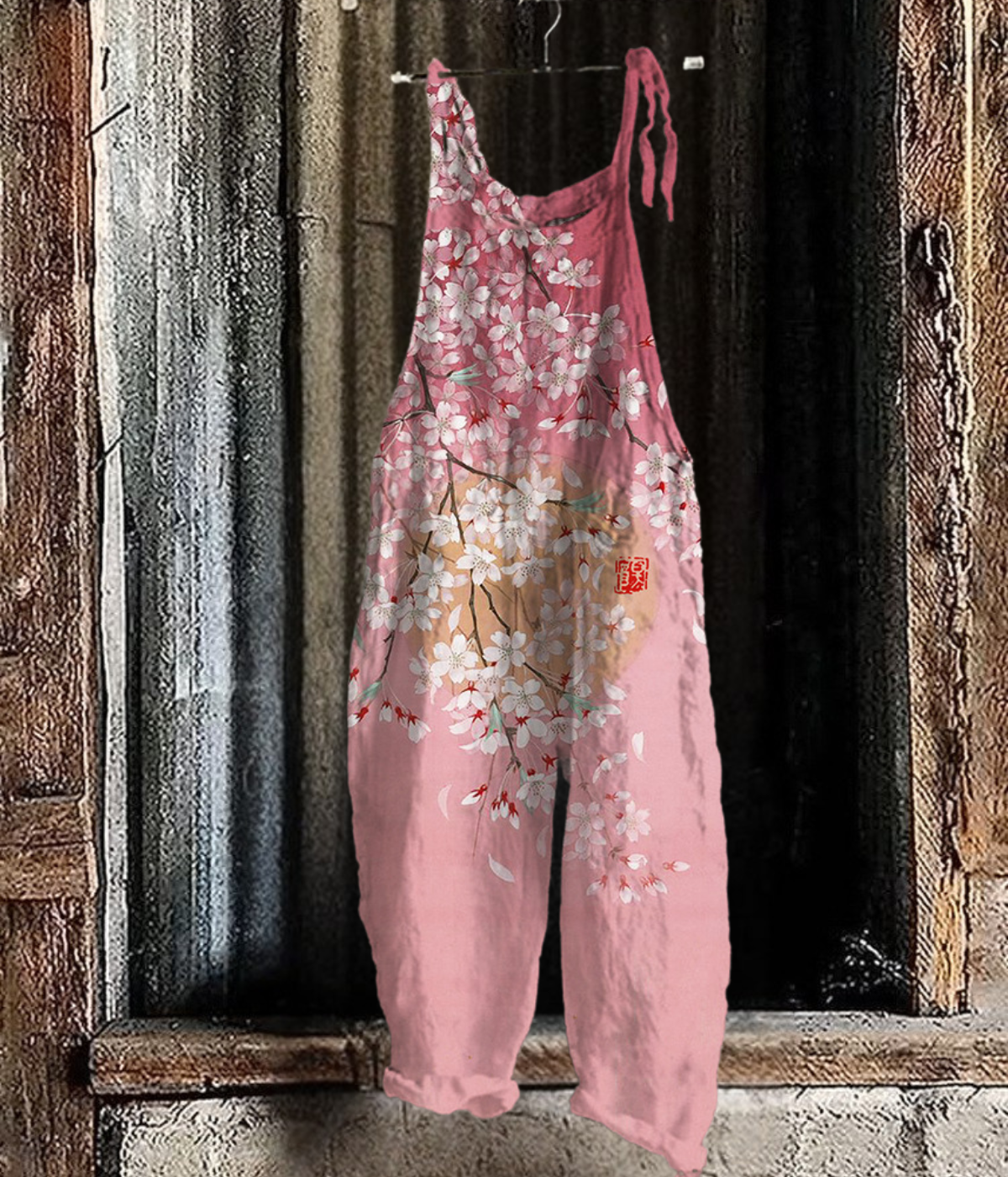 ピンクブロッサムのジャンプスーツ
