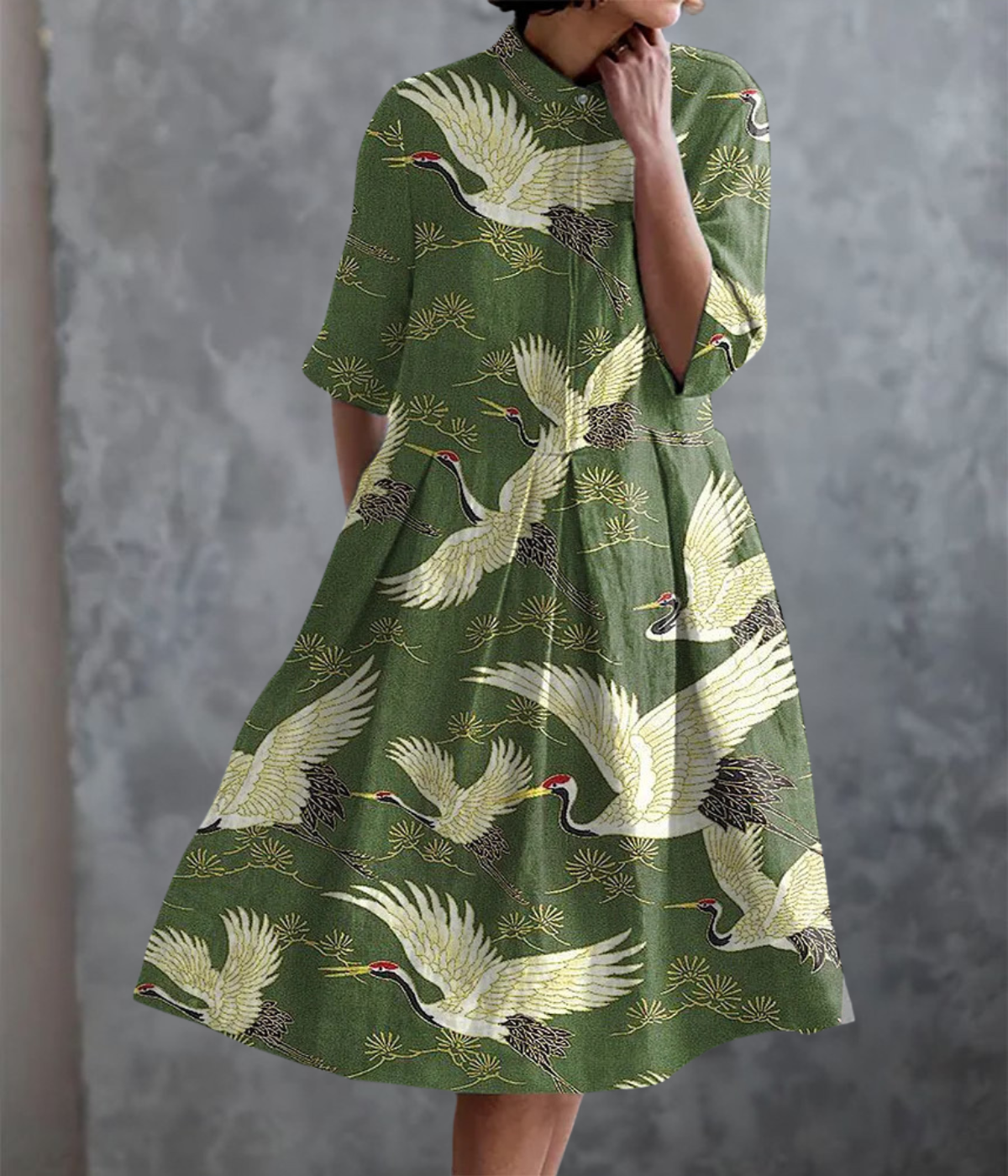 緑の鳥柄のダブルポケットドレス